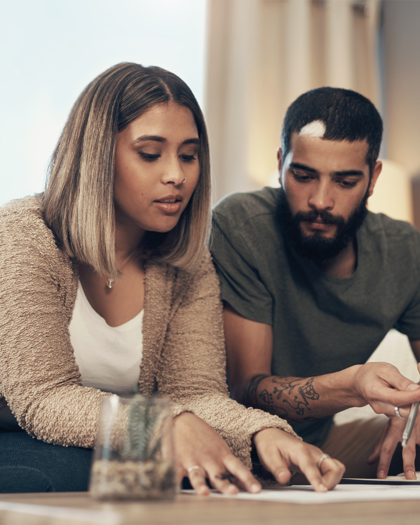 Couple discussing prenuptial agreement