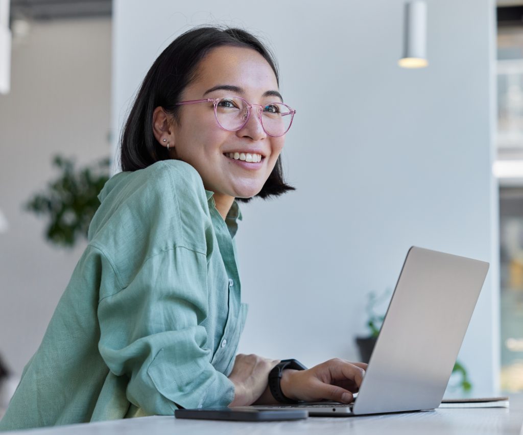 Woman smiles while making a prenuptial agreement